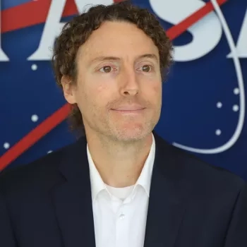 Sean Pictured in front of the original NASA logo