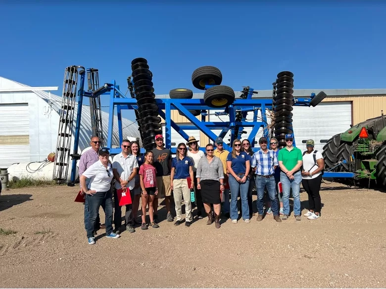 NASA scientists pose with members of the University of Nebraska Lincoln faculty and extension and Zach Hunnicutt of Hunnicutt farms in Giltner, Nebraska. Credits: NASA